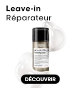 Le texte indique « Leave-in Réparateur » et « DÉCOUVRIR ». Image du produit montrant un flacon pulvérisateur noir avec une étiquette blanche sur fond blanc avec des éléments de conception circulaires.