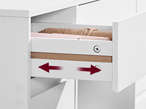 Tiroir ou meuble blanc présentant un mécanisme coulissant réglable avec des flèches directionnelles indiquant la plage de mouvement.