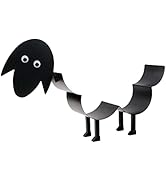 Le texte se lit comme suit : « Image 1 ». Mouton ou chien en papier noir fabriqué à partir d'une tête circulaire avec des yeux et de segments de corps incurvés pliés en accordéon créant une forme d'animal ludique.