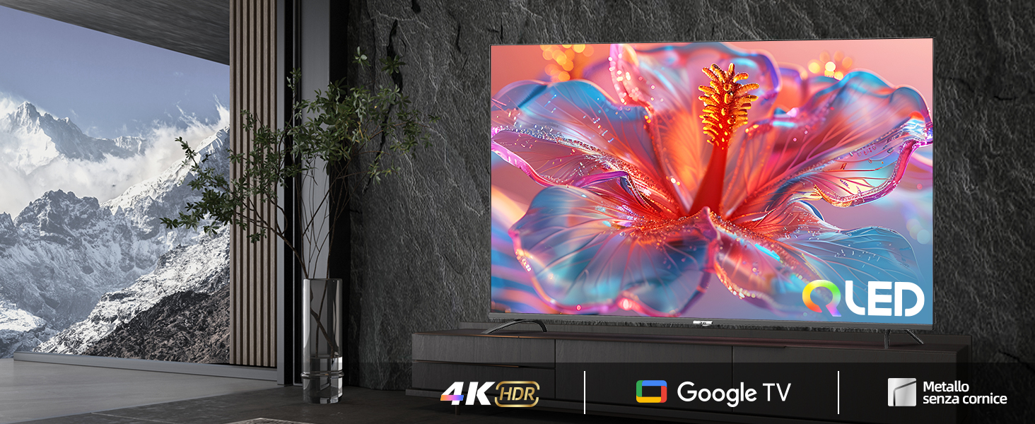 Grand téléviseur QLED affichant une fleur rose éclatante sur fond de montagnes enneigées. Le téléviseur est doté d'une résolution 4K et de Google TV, qui met en valeur la qualité d'image et les fonctionnalités intelligentes.