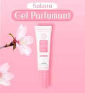 sur fond rose avec des fleurs de cerisier. Tube blanc avec étiquette rose indiquant le nom du produit et des images de fleurs de cerisier.