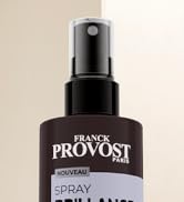Le texte indique « FRANCK PROVOST ». Vue rapprochée du produit d'un flacon pulvérisateur noir avec la marque Franck Provost sur fond neutre.