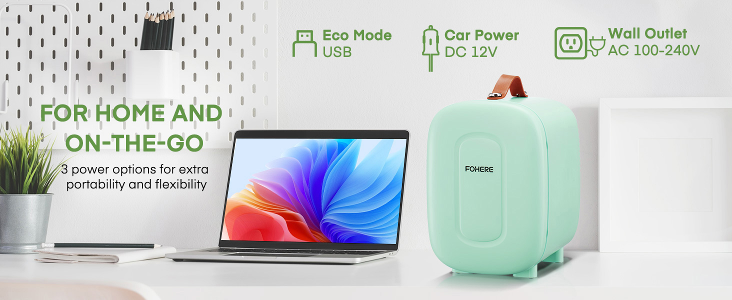 un ordinateur portable avec une coque verte et un ordinateur portable bleu avec une batterie dessus.