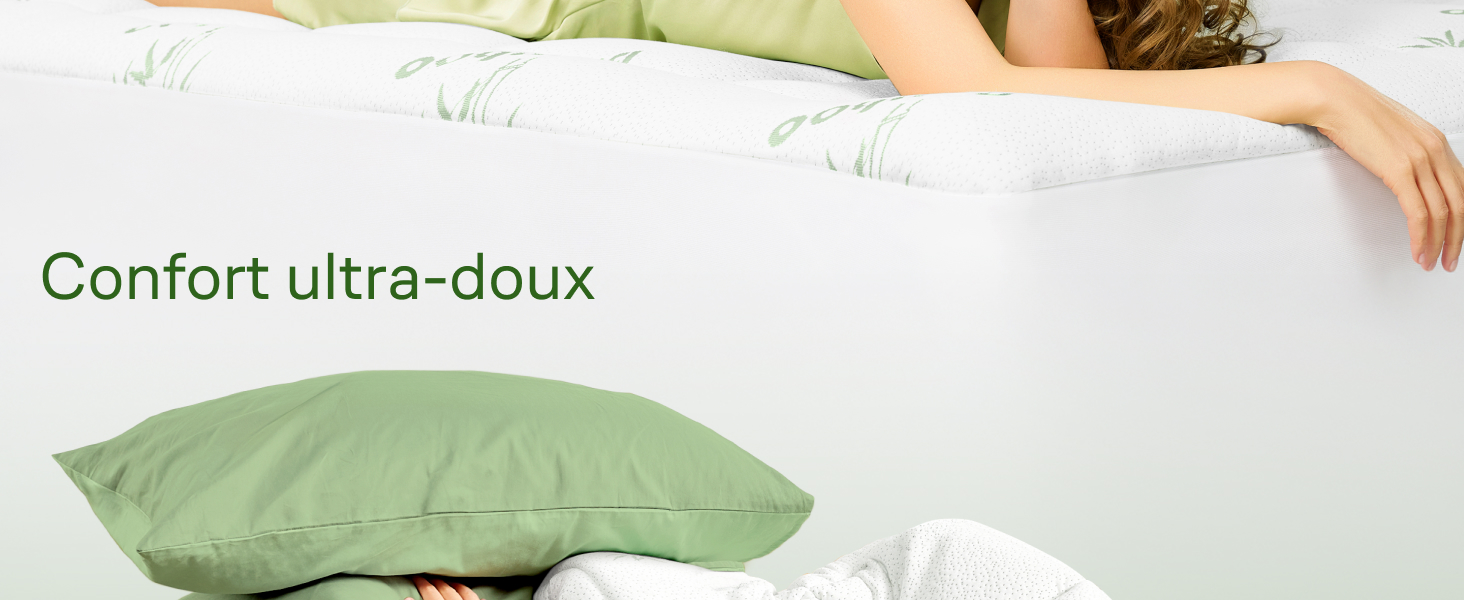 Le texte indique « Confort ultra-doux ». Vue rapprochée de la surface en peluche ou en tissu doux avec un tissu vert visible.